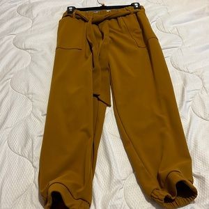 Woman tan Bollywood pants